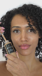 Video of woman applying foundation